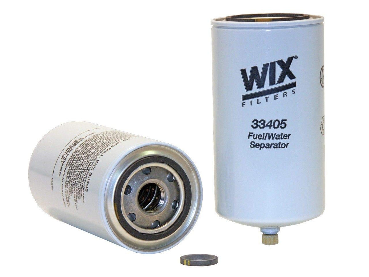 Wix filter beside ruler for scale, helps confirm sizing and fitment benefit