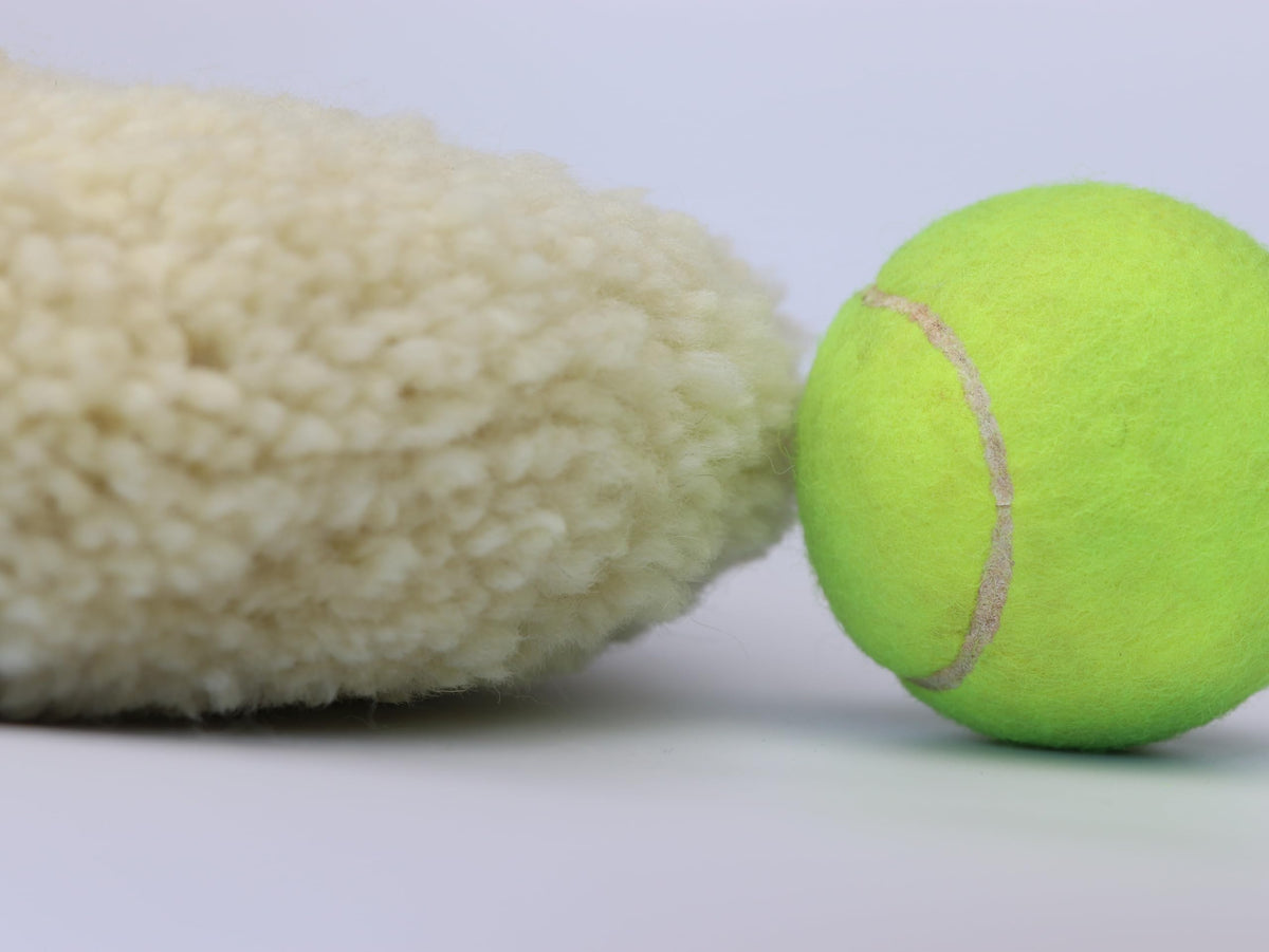 Woolous pad mounted on polisher demonstrating fast defect removal benefit