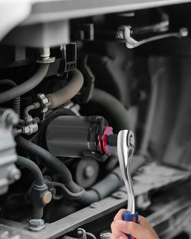 WORKPRO set on garage bench staged for an oil change showing ready-to-use convenience