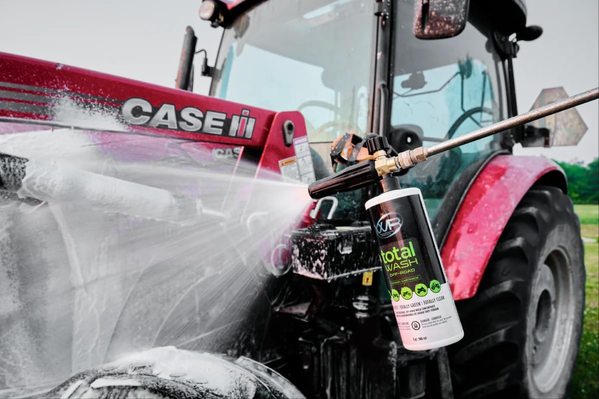 WR Total Wash being dispensed from a foam cannon cleaning off-road vehicle for faster removal