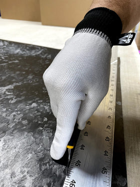 Generic WrapGlove on hand demonstrating one-size fit for medium to XL benefit