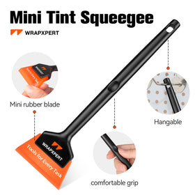 WRAPXPERT mini squeegee used on car window for tight-corner smoothing benefit