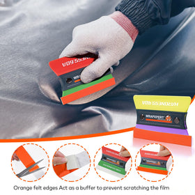 WRAPXPERT next to ruler to show scale and ergonomic grip for precise handling
