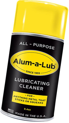WRS Alum-a-Lub spraying onto a rusty hinge to free stuck parts and reduce friction quickly