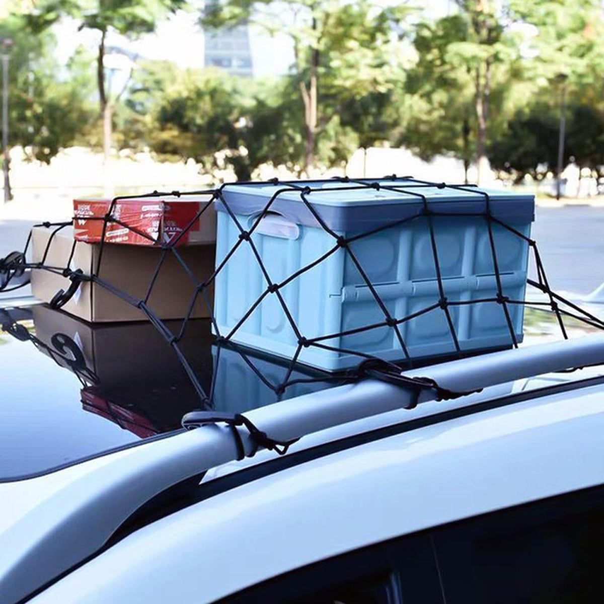 WSSROGY net on roof rack holding camping gear for safe travel