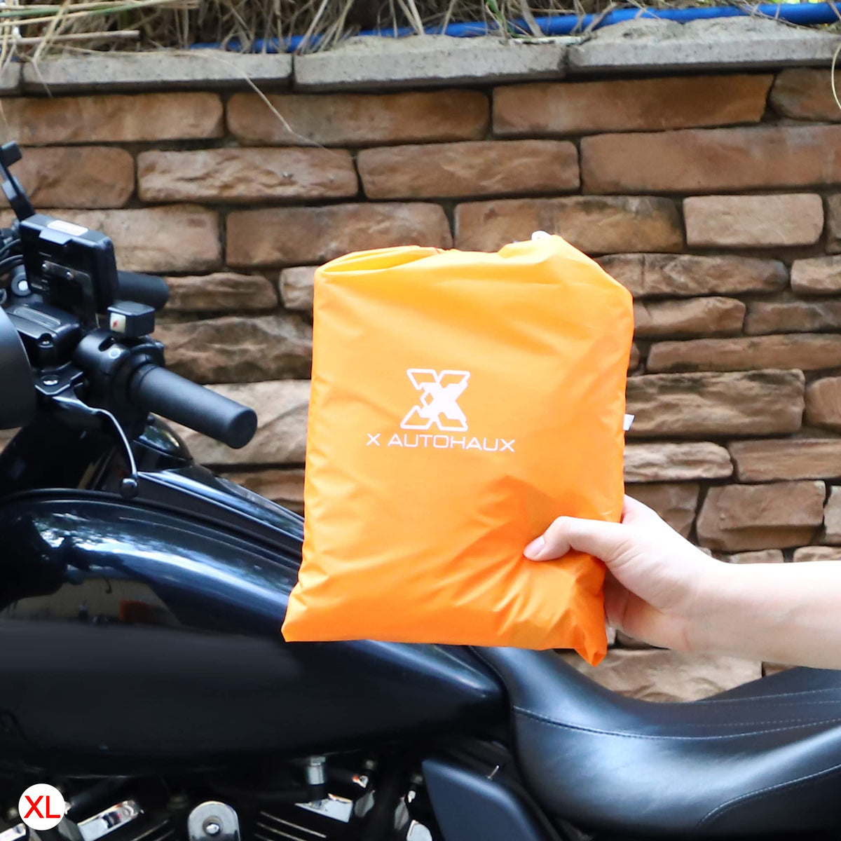 X AUTOHAUX folded cover in carry bag showing compact portability benefit