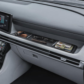 X-TKER lifestyle image of passenger tray with organized items