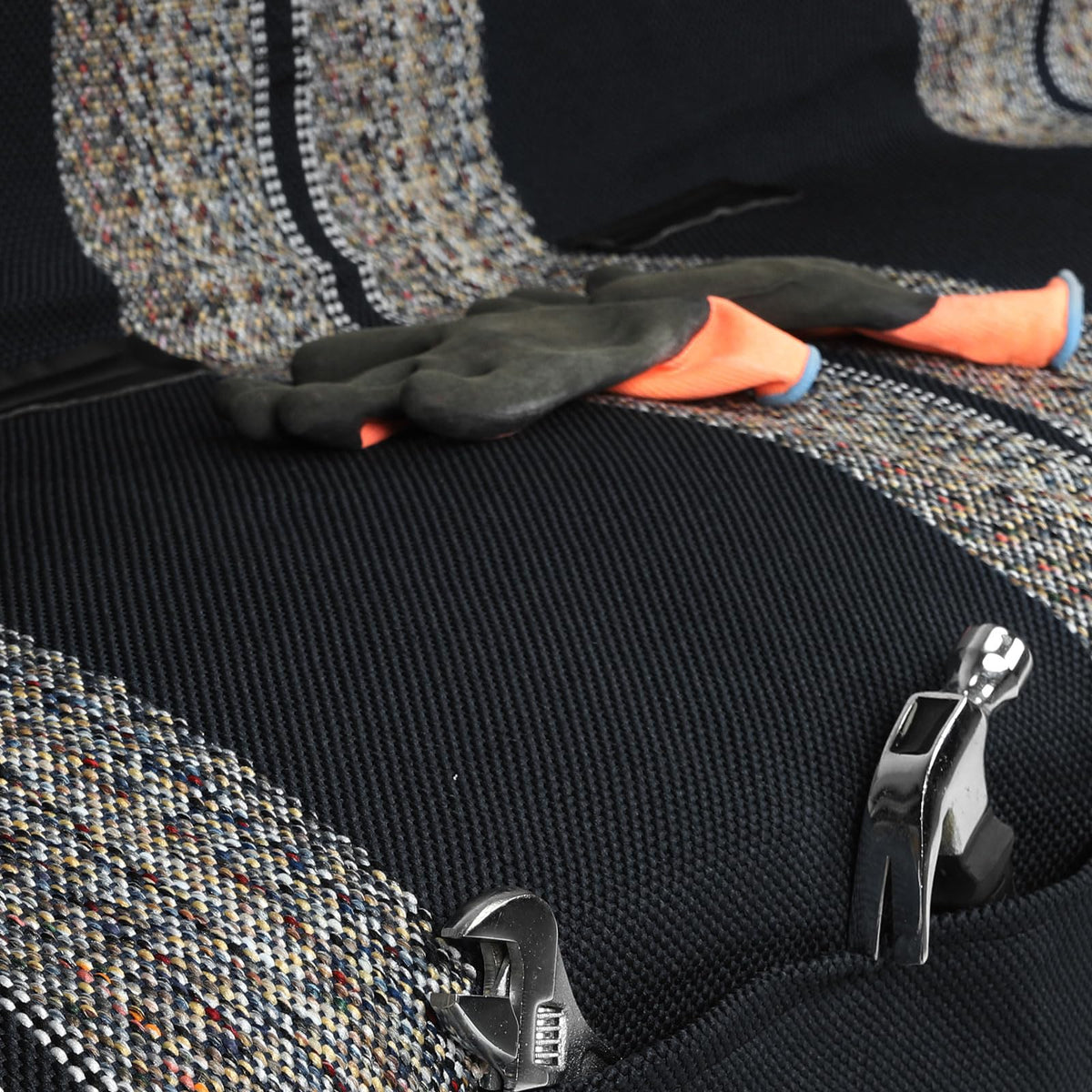 XCAR front pocket closeup showing storage pockets keeping items organized