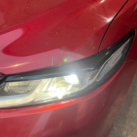 Xhfarce headlight edge protection detail showing coverage and dirt resistance