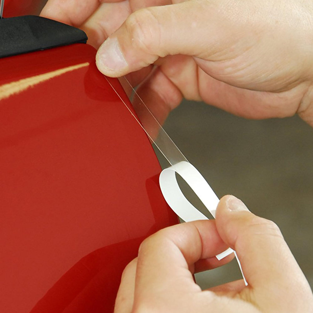 XPEL film protecting vehicle in garage showing preserved paint benefit