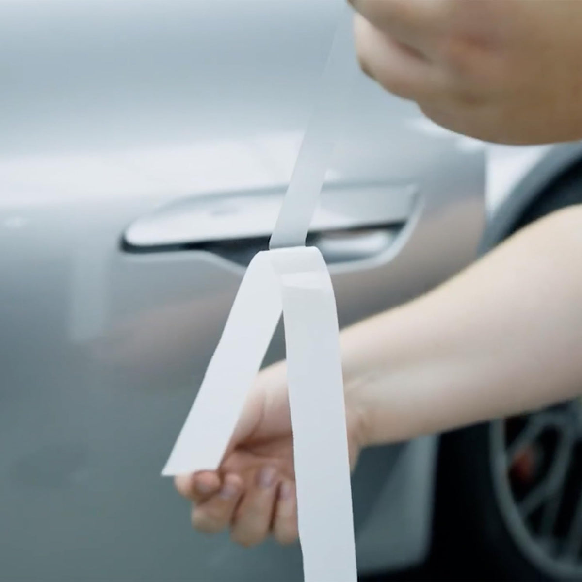 XPEL demonstration of self-healing film reducing minor scratch visibility