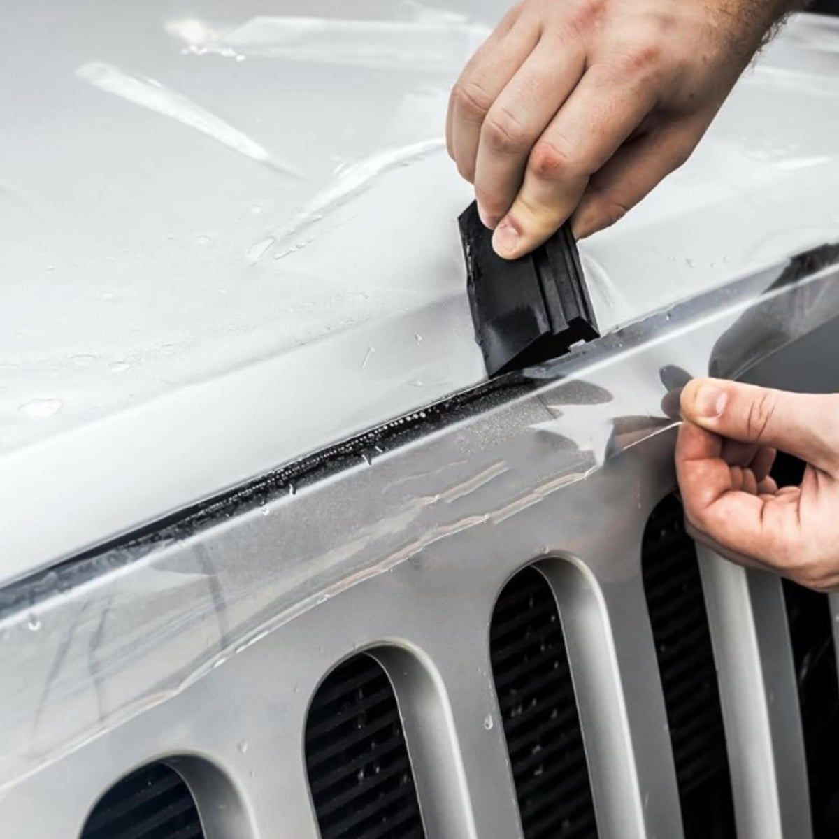 XPEL installed on parked car showing discreet protection benefit