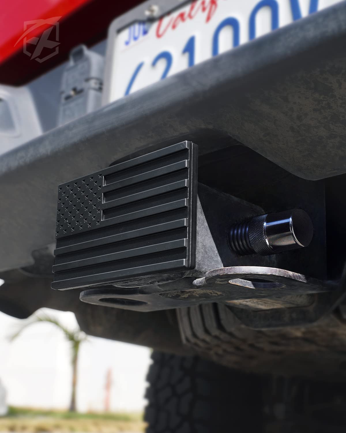 Xprite lifestyle shot of hitch cover on vehicle illustrating weather protection
