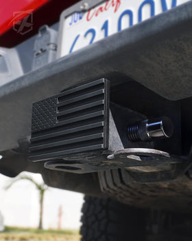 Xprite lifestyle shot of hitch cover on vehicle illustrating weather protection