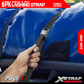XSTRAP STANDARD held in hand for scale showing 8ft length and portability benefit