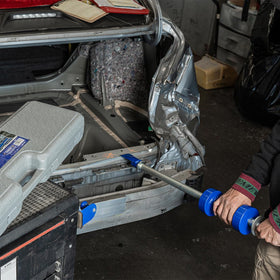 XtremepowerUS puller in use on car hub demonstrating extraction benefit