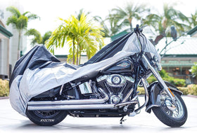 XYZCTEM side profile over bike with saddlebags showing tailored fit benefit