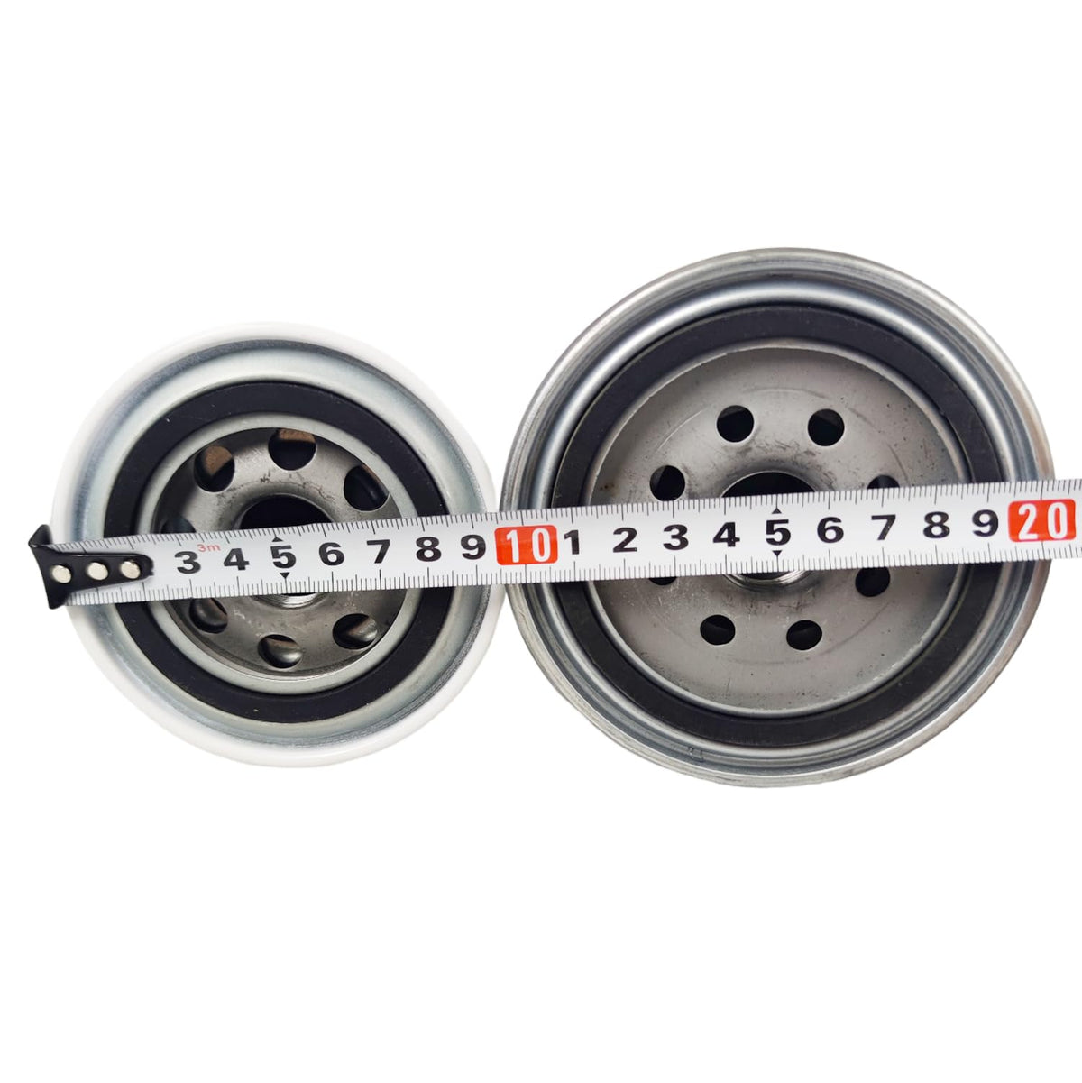 XYZIL fuel filter detail showing inlet/outlet fittings for accurate, leak-free connection