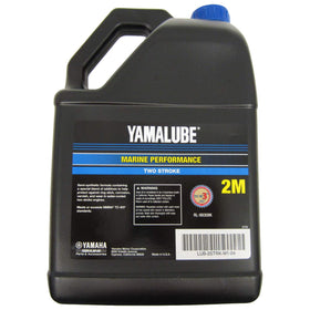 Yamaha Yamalube being poured into outboard engine demonstrating clean lubrication