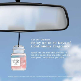 Yankee Candle label and shrinking insert visible to indicate when to replace