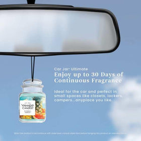 Yankee Candle on dashboard showing compact size and unobtrusive benefit