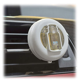 Yankee Candle vent clip clipped to car vent demonstrating installation and steady fragrance distribution