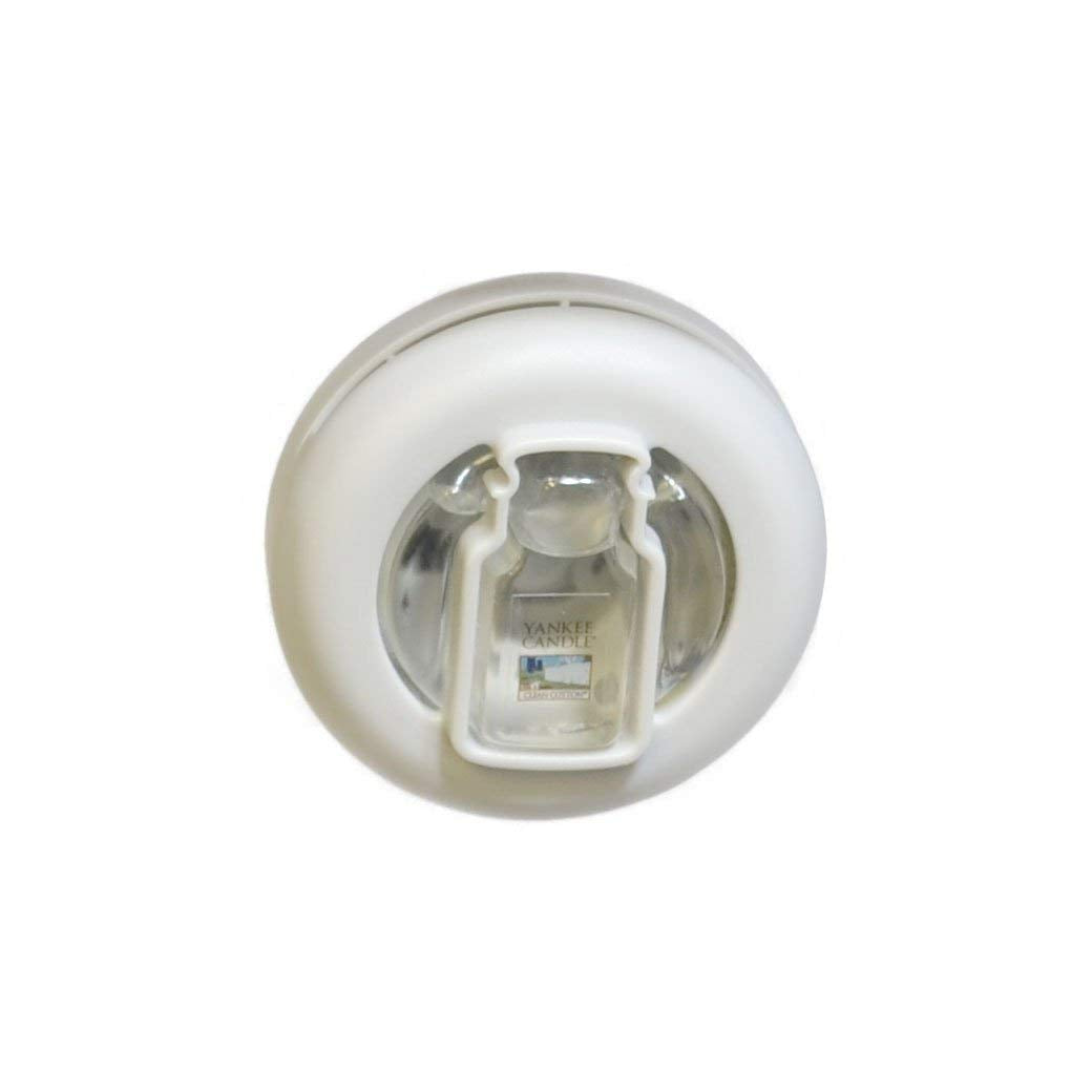Yankee Candle vent clip attached to car vent demonstrating secure fit and steady freshness
