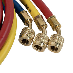 YELLOW JACKET manifold held in hand illustrating compact size and reach