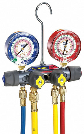 Yellow Jacket manifold connected to vacuum pump and tank illustrating faster evacuation workflow