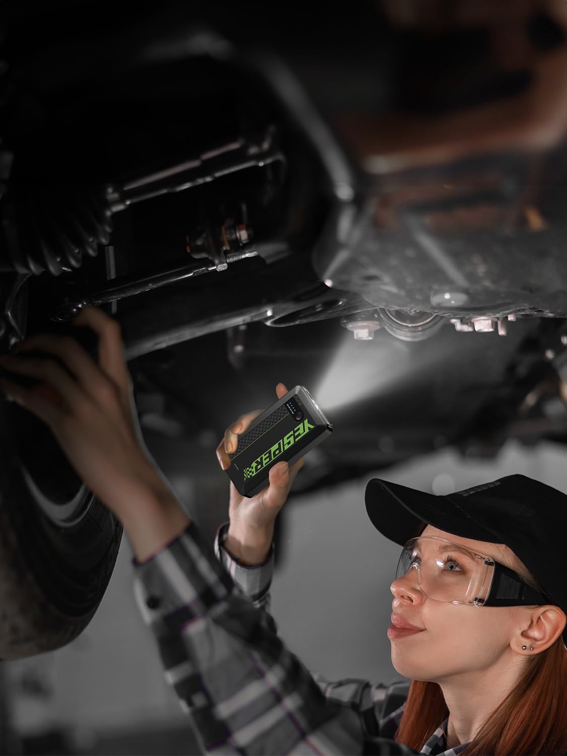 YESPER compact jump starter stored in a glovebox showing easy everyday carry