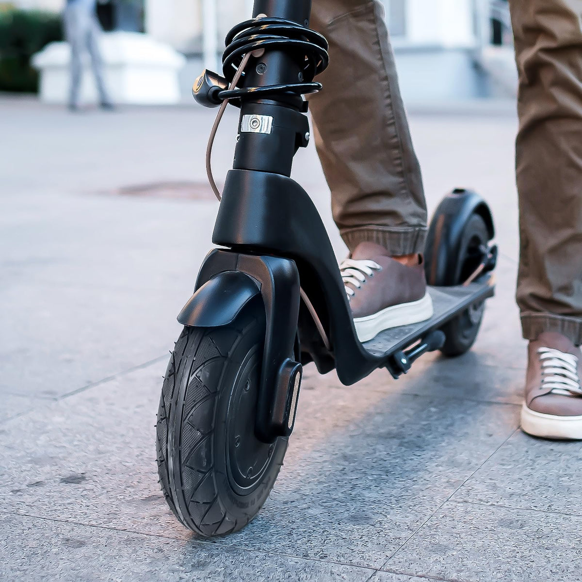 YeYouC scooter in urban setting with new tires showing enhanced comfort and stability
