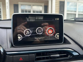 Ymiko installed in Mazda 3 infotainment showing like-new display integration