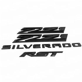 Yoaoo RST badge closeup showing three-dimensional molding and sharp contrast