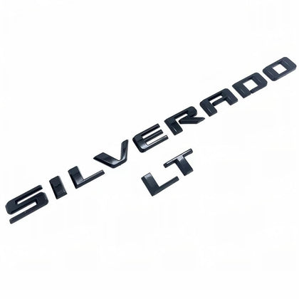Yoaoo Silverado front badge glossy black showing clean factory fit and updated look