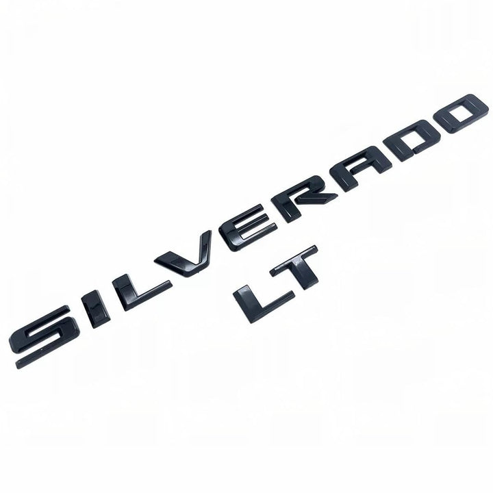 Yoaoo Silverado front badge glossy black showing clean factory fit and updated look