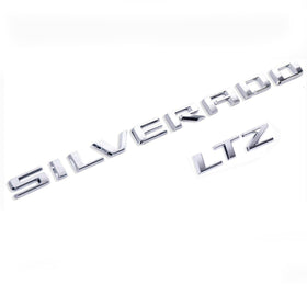 Yoaoo Silverado and LTZ badges front view showing glossy chrome branding and factory look