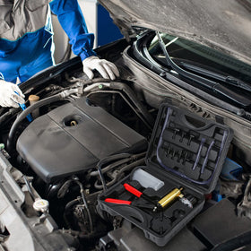 Yonligonju in use bleeding car brake showing single-person operation and clean fluid removal