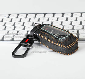 YONUFI fob held in hand showing size and easy handling benefit