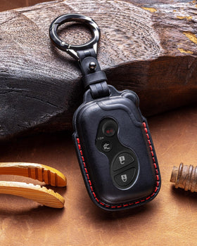YONUFI leather key fob cover lifestyle shot on nightstand offering stylish protection