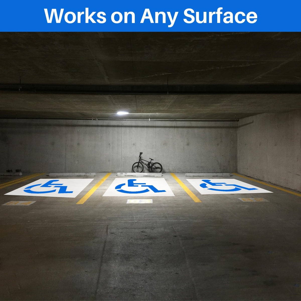 YRUWTTA stencil placed on asphalt showing size and scale for accurate symbol positioning