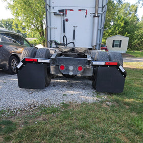 ZANURA mud flaps on truck on highway reducing spray and wear