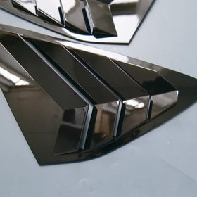 ZiWen louvers next to ruler for scale showing compact low-profile