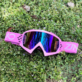 ZJNUO goggles next to hand for size comparison showing compactness