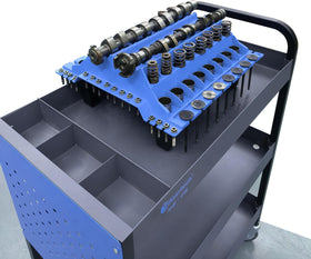 ZKTOOL tray in use on a garage workbench speeding up cylinder head rebuilds