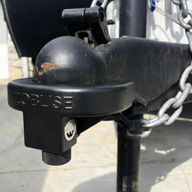 Zoblise lock next to tape measure showing compact size and easy storage