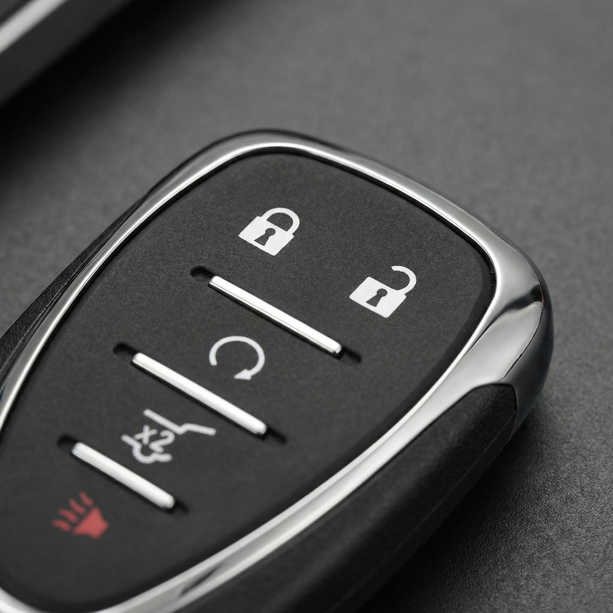 ZODCCHSP fob on driveway near Equinox showing convenient remote access and remote start readiness