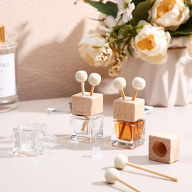 Zubebe wooden cap with fragrance sticks close-up showing natural finish and diffusion