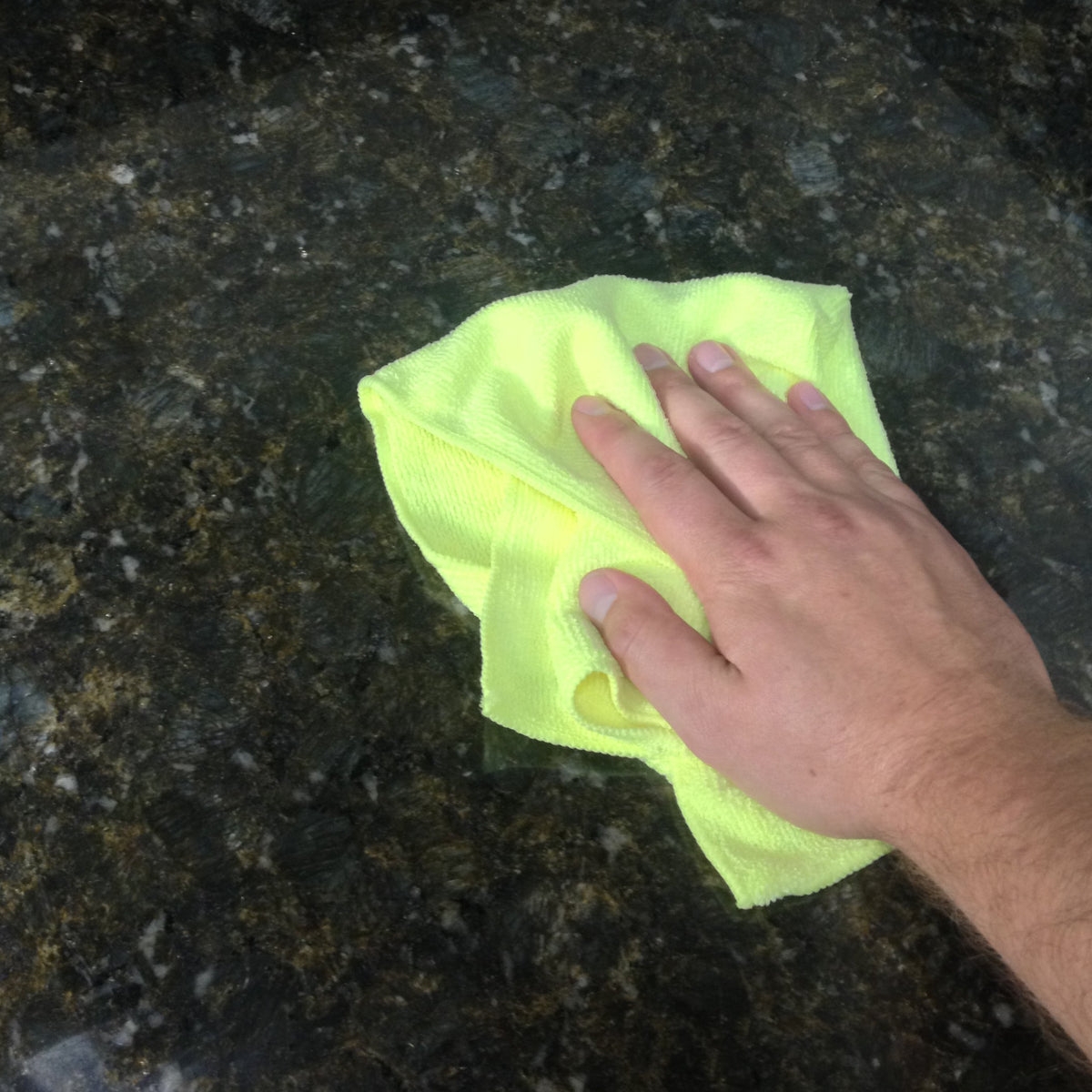 Zwipes towel used for pet grooming absorbing moisture and hair