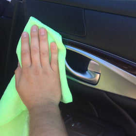Zwipes cloth beside ruler showing 12x16 size for accurate scale
